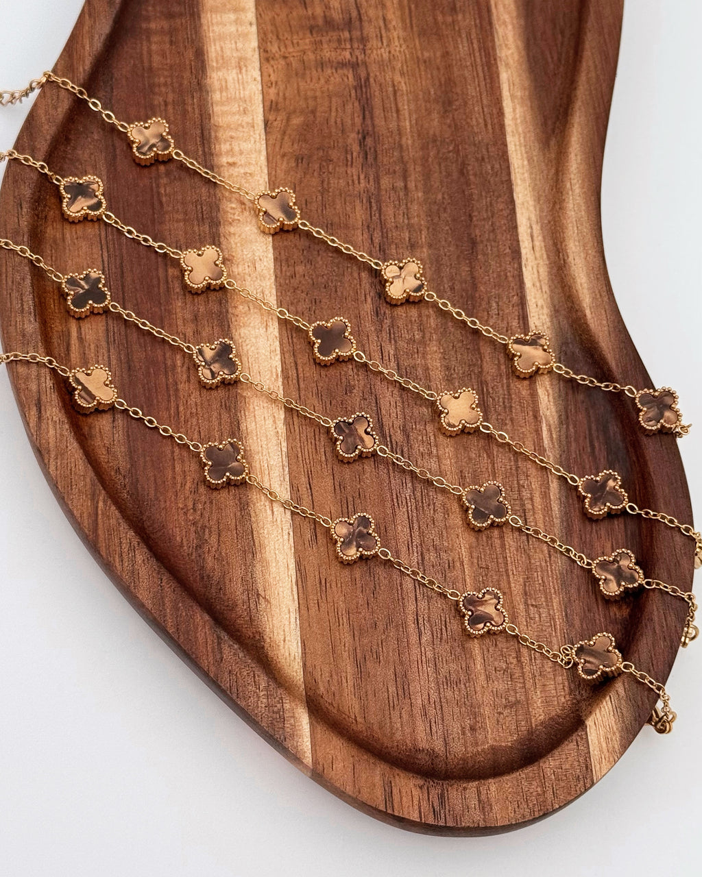 Pulseira mini trevos 🤎