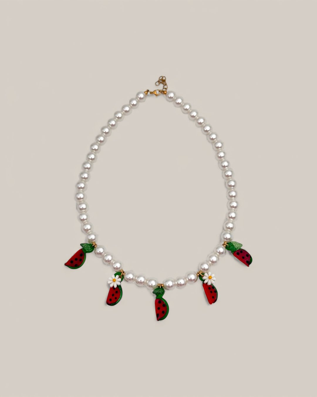 Colar pérolas c/ melancias