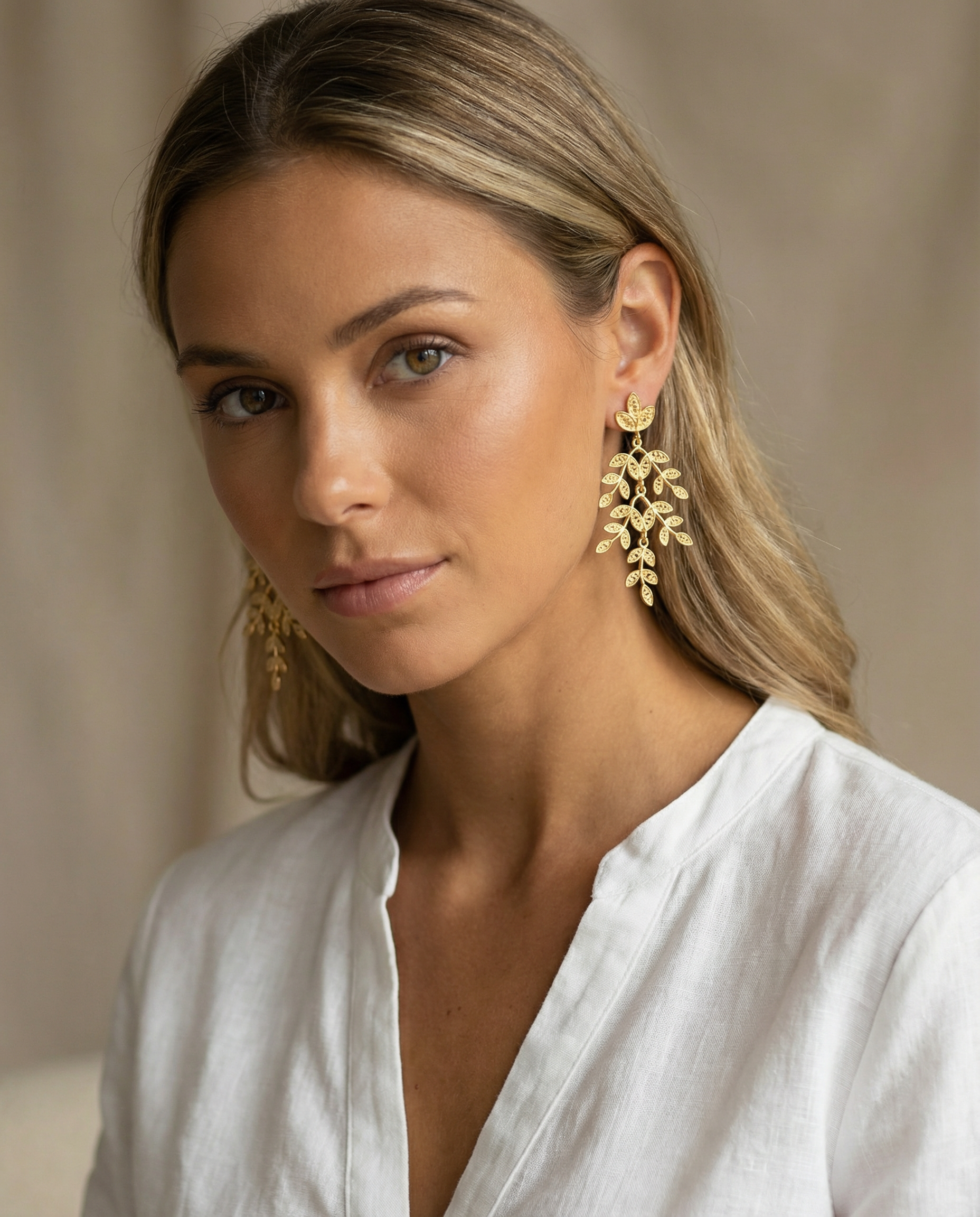 Brincos folhas compridos