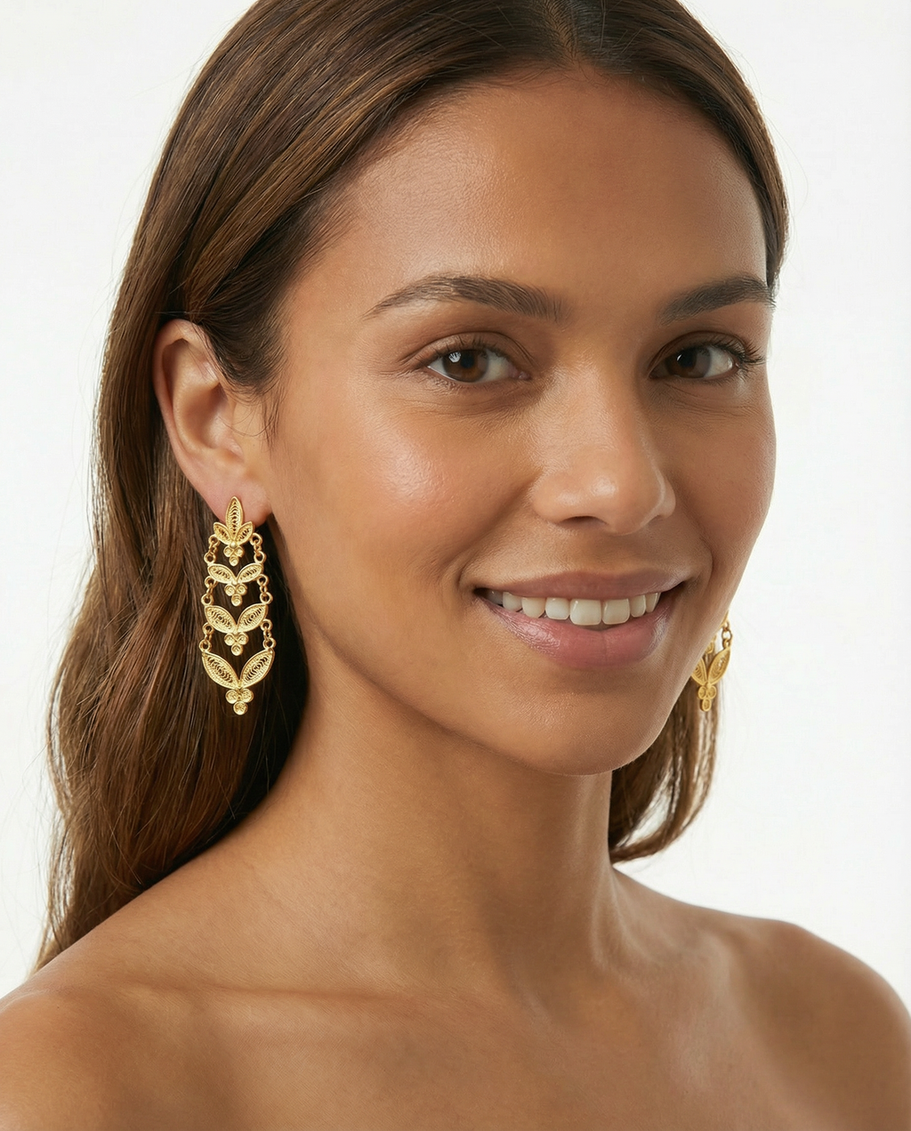 Brincos folhas camadas