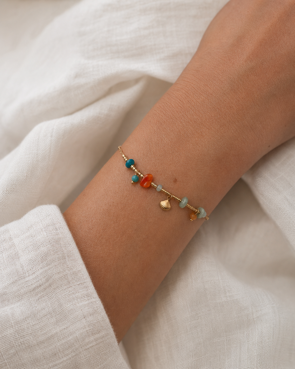 Pulseira pedrinhas c/ concha